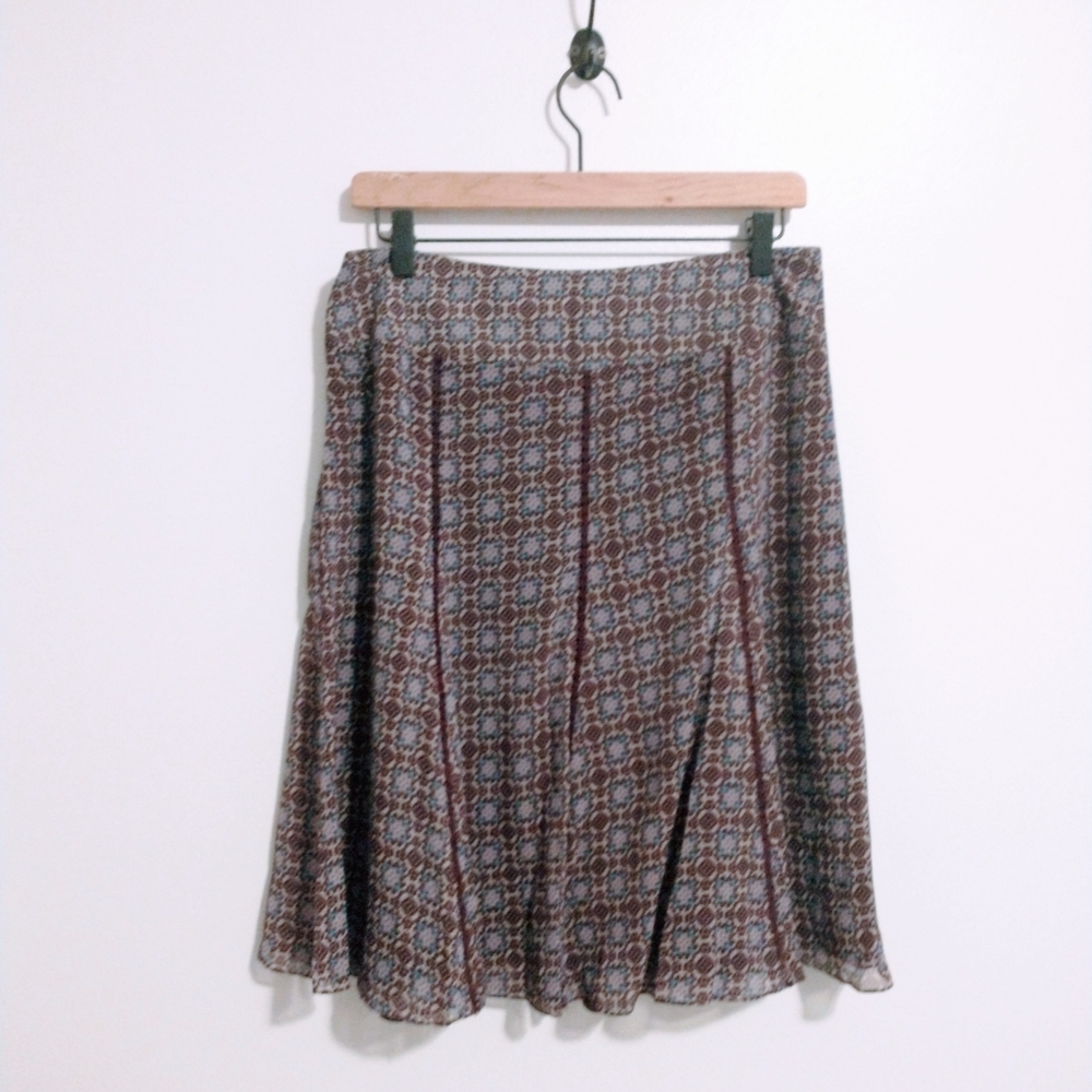 Paisley skirt a long axcess, size tag removed, waist is 15", lined